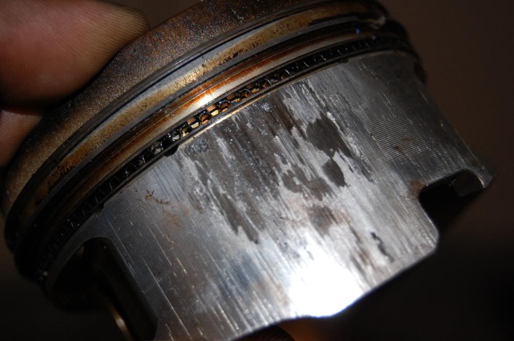 possible scuffed/collapsed piston skirt??? (pic/vid